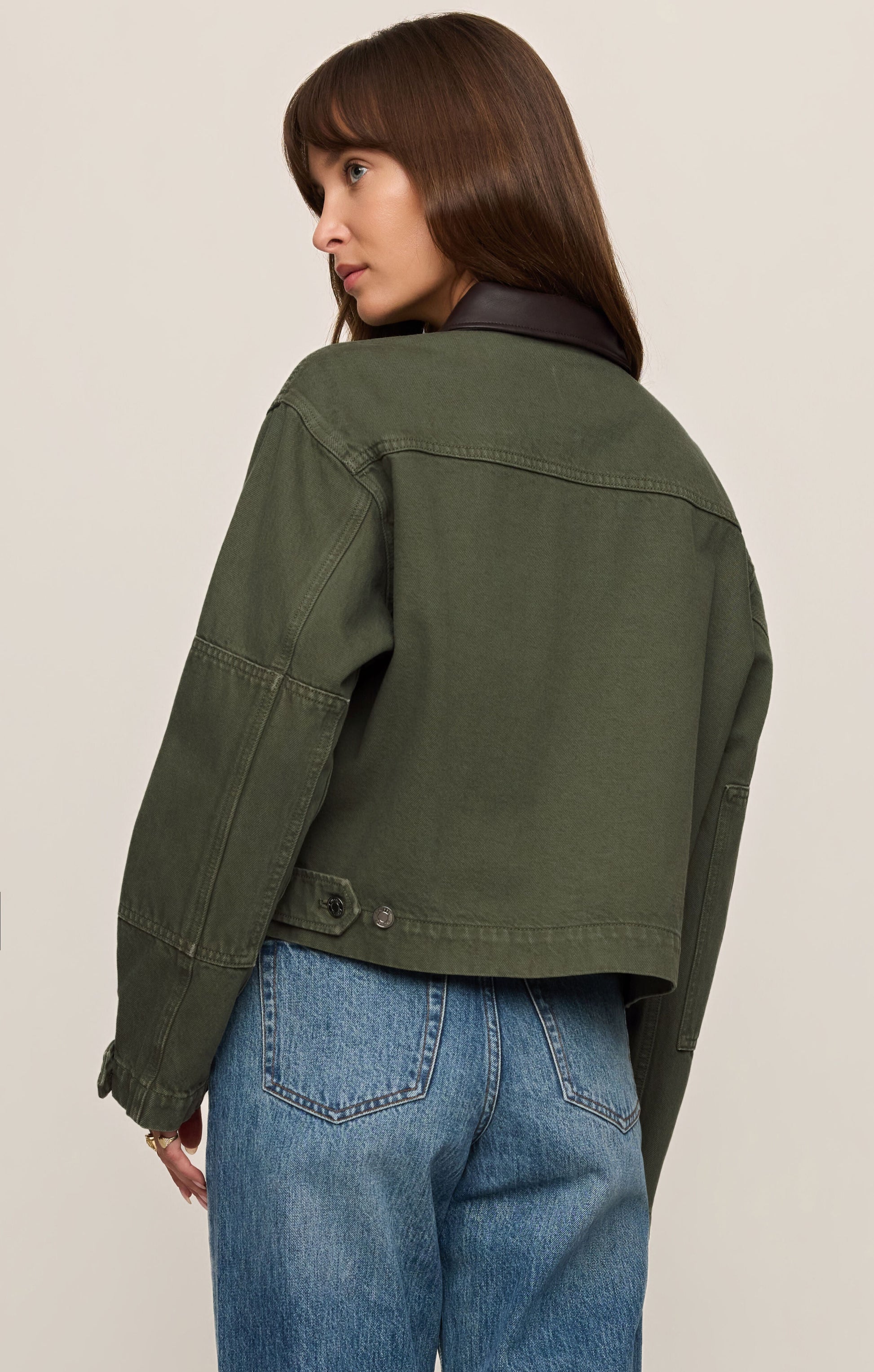 Back view of green chore jacket 
